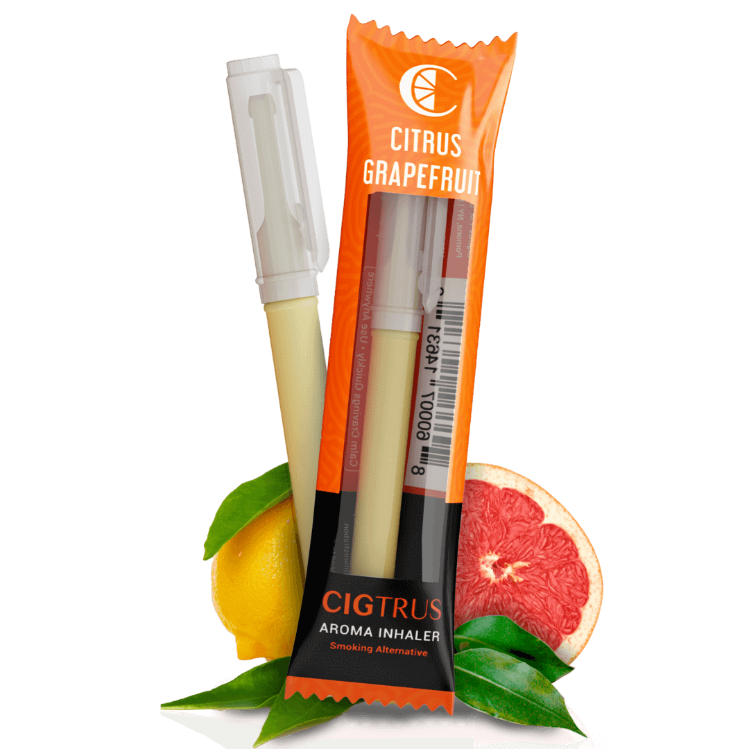 Citrus Grapefruit aroma inhaler with orange packaging, surrounded by fresh grapefruit and lemon, smoking alternative.