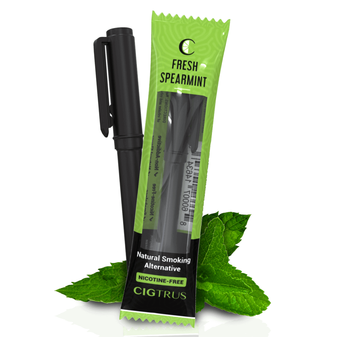 Nicotine-free spearmint smoking alternative with pen and fresh mint leaves, CIGTRUS branding, eco-friendly choice.