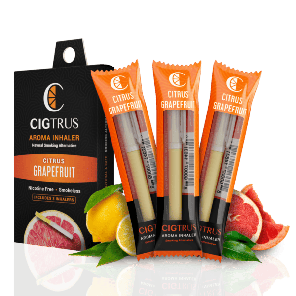 Citrus grapefruit aroma inhaler pack with three smokeless, nicotine-free inhalers, surrounded by fresh oranges and grapefruit.