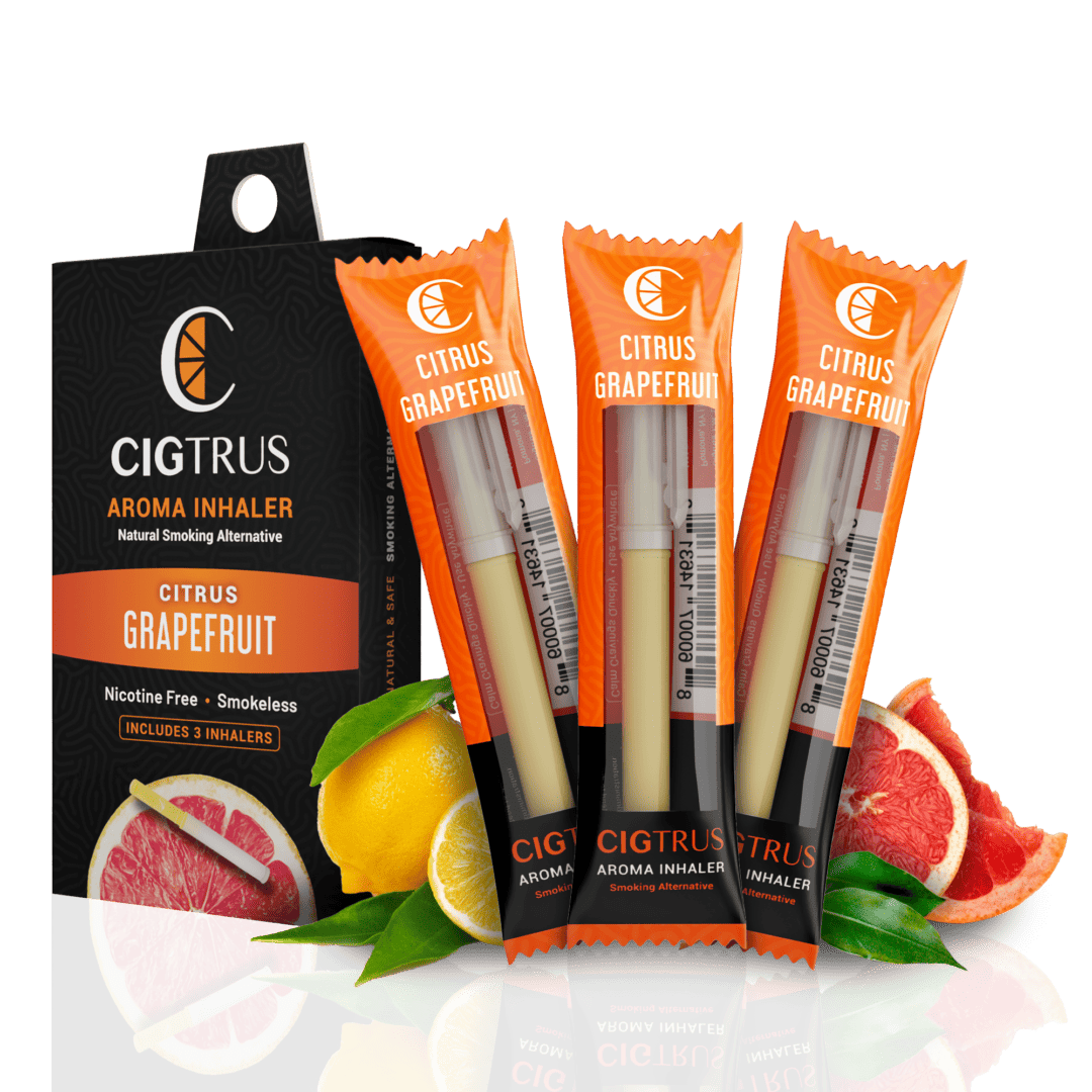 Citrus grapefruit aroma inhaler pack with three smokeless, nicotine-free inhalers, surrounded by fresh oranges and grapefruit.