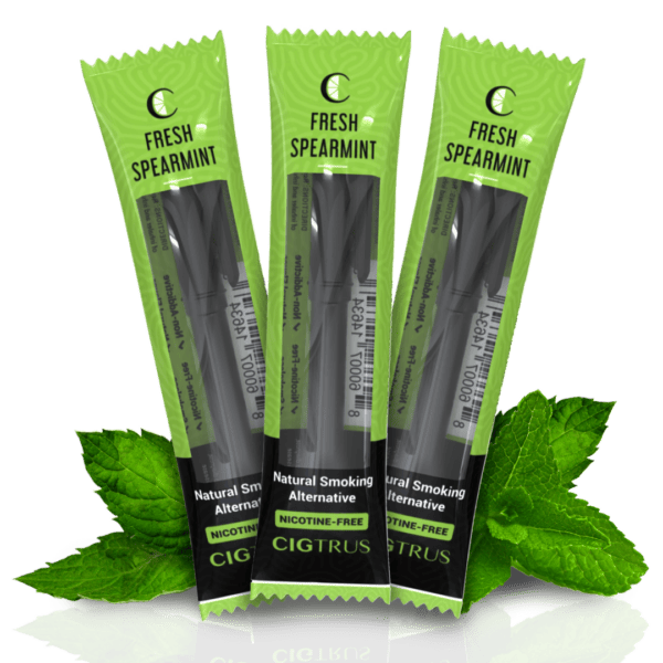 Three packs of CIGTRUS Fresh Spearmint, nicotine-free smoking alternative, with vibrant green packaging and mint leaves.