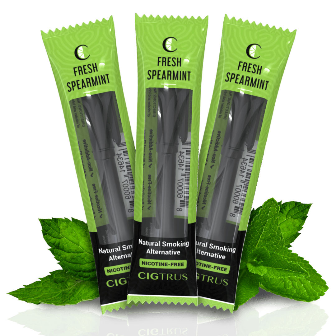 Three packs of CIGTRUS Fresh Spearmint, nicotine-free smoking alternative, with vibrant green packaging and mint leaves.